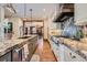 Well-equipped kitchen featuring granite countertops, ample storage, and modern lighting at 680 N Emerson St, Denver, CO 80218