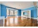 Large room featuring hardwood floors, custom built-ins, unique architecture, and lots of natural light at 680 N Emerson St, Denver, CO 80218