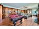 Spacious living room with hardwood floors, built-in bookshelves, and natural light at 680 N Emerson St, Denver, CO 80218