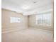 Spacious finished basement with neutral carpeting at 9543 Pearl Cir # 101, Parker, CO 80134