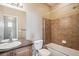 Bathroom with double vanity and shower/tub combo at 9543 Pearl Cir # 101, Parker, CO 80134