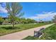 Community green space with walking path and gazebo at 9543 Pearl Cir # 101, Parker, CO 80134