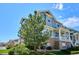 Two-story home with stone and siding exterior at 9543 Pearl Cir # 101, Parker, CO 80134