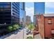 City view with modern buildings and street below at 1512 Larimer St # 39, Denver, CO 80202