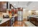 Chef's kitchen with stainless steel appliances, granite countertops, and ample cabinet space for culinary enthusiasts at 1512 Larimer St # 39, Denver, CO 80202