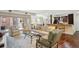 Open-concept living area with hardwood floors and access to outdoor space at 1512 Larimer St # 39, Denver, CO 80202