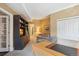 Inviting living room featuring a cozy seating area, custom built-in shelving, and a stylish workspace at 1512 Larimer St # 39, Denver, CO 80202