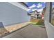 Small backyard offers a compact outdoor space featuring gravel, artificial turf and fencing for privacy at 3390 Cranston Cir, Highlands Ranch, CO 80126