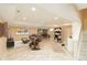 Finished basement offers a cozy living area, entertainment space, and room for fitness with neutral colors and lighting at 3390 Cranston Cir, Highlands Ranch, CO 80126