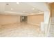 Unfurnished basement boasts recessed lighting, neutral walls, and hardwood floors creating a blank canvas for customization at 3390 Cranston Cir, Highlands Ranch, CO 80126
