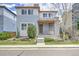 Charming two-story home featuring a tidy front yard, modern siding, and a welcoming front porch at 3390 Cranston Cir, Highlands Ranch, CO 80126