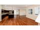 Spacious living area with hardwood floors, modern finishes, and ample natural light at 3390 Cranston Cir, Highlands Ranch, CO 80126