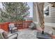 Charming deck with comfortable seating and a colorful outdoor rug at 4053 S Riviera St, Aurora, CO 80018