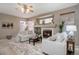 Inviting living room with a cozy fireplace, plush seating, and a neutral color palette at 4053 S Riviera St, Aurora, CO 80018