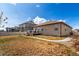 Spacious backyard with an inviting wood deck, perfect for outdoor entertaining at 10266 Stagecoach Ave, Firestone, CO 80504
