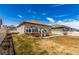 Fenced yard featuring a wood deck, ideal for enjoying the outdoors at 10266 Stagecoach Ave, Firestone, CO 80504