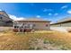 Backyard featuring manicured lawn, with a patio perfect for outdoor relaxation at 10266 Stagecoach Ave, Firestone, CO 80504