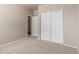 Bedroom with closet and open doorway at 10266 Stagecoach Ave, Firestone, CO 80504