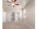 Bright bedroom with access to a walk-in closet and bathroom at 10266 Stagecoach Ave, Firestone, CO 80504