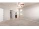 Bedroom with ample space, bright window and ceiling fan at 10266 Stagecoach Ave, Firestone, CO 80504