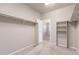 Spacious walk-in closet with carpet and shelving at 10266 Stagecoach Ave, Firestone, CO 80504