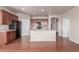 Modern kitchen with an island, stainless steel appliances and beautiful cabinets at 10266 Stagecoach Ave, Firestone, CO 80504