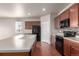 Kitchen with granite countertops, stainless steel appliances, and a large island at 10266 Stagecoach Ave, Firestone, CO 80504