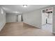 Finished basement with laminate floors, laundry room, and recessed lighting at 1765 S Endicott St, Lakewood, CO 80232