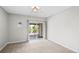 Bedroom with sliding glass door leading to outdoor deck at 1765 S Endicott St, Lakewood, CO 80232