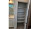 Open shelving in a bathroom linen closet at 498 Grey Rock St, Brighton, CO 80601