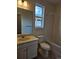 Clean bathroom with a bathtub, toilet, and vanity at 498 Grey Rock St, Brighton, CO 80601