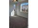 Spacious bedroom with neutral carpeting and large windows at 498 Grey Rock St, Brighton, CO 80601