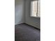 Simple bedroom with carpet, one window, and neutral walls at 498 Grey Rock St, Brighton, CO 80601