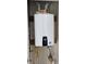 Navien tankless water heater in closet at 498 Grey Rock St, Brighton, CO 80601