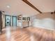 Finished basement featuring a bar area and wood-look flooring at 2446 S Vaughn Way # A, Aurora, CO 80014