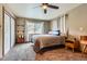 Bedroom with a closet, large window, and a ceiling fan at 4 Virginia St, Idaho Springs, CO 80452