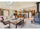 Cozy open concept living room featuring hardwood floors and a wood stove at 4 Virginia St, Idaho Springs, CO 80452