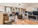 Spacious living room with natural light, hardwood floors, and functional areas for relaxation and work at 4 Virginia St, Idaho Springs, CO 80452