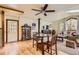 Open floor plan featuring a dining table and chairs in a living room with hardwood floors at 4 Virginia St, Idaho Springs, CO 80452