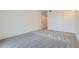 Spacious bedroom features neutral carpet and large closet for ample storage at 7000 E Quincy Ave # 317, Denver, CO 80237