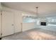 Elegant dining area features stylish lighting and seamlessly integrates with the living space at 7000 E Quincy Ave # 317, Denver, CO 80237