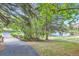 Scenic walkway with a view of a small pond and lush greenery at 7000 E Quincy Ave # 317, Denver, CO 80237