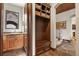 Functional mudroom with built-in storage, bench, and hooks to help keep you organized at 4839 Bandera Pl, Parker, CO 80134