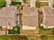 Overhead aerial shot showcases a well-maintained roof, a private backyard, and landscaping in a cozy neighborhood at 11649 E 111Th Ave, Commerce City, CO 80640