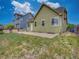 A spacious backyard with a concrete patio, perfect for outdoor entertaining at 11649 E 111Th Ave, Commerce City, CO 80640