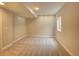 This finished basement has recessed lights, carpeted floors and a single window for natural light at 11649 E 111Th Ave, Commerce City, CO 80640