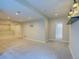 This expansive finished basement features recessed lights and a nearby bar and lounge area at 11649 E 111Th Ave, Commerce City, CO 80640