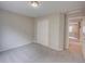 This bedroom features neutral walls, carpeted floors and a closet with white doors at 11649 E 111Th Ave, Commerce City, CO 80640
