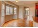 Bright dining area with hardwood floors, bay windows, and natural light at 11649 E 111Th Ave, Commerce City, CO 80640