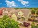 Charming two-story house featuring a well-manicured lawn, attached garage, and inviting front porch at 11649 E 111Th Ave, Commerce City, CO 80640
